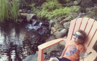 Relaxing next to pond