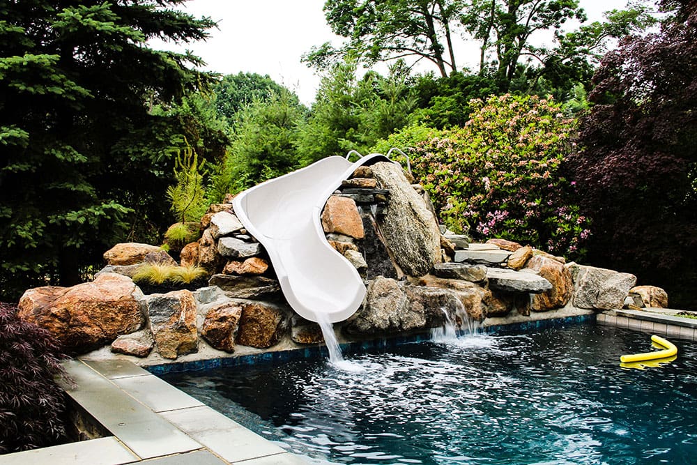 Custom stonework for pool and waterslide