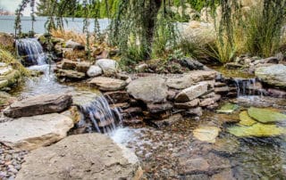 Large waterfall with koi pond