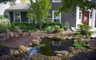 Koi pond and waterfall in front yard