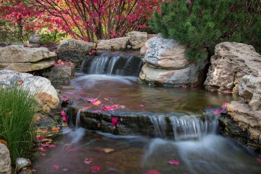 Small waterfall in a landscaped garden